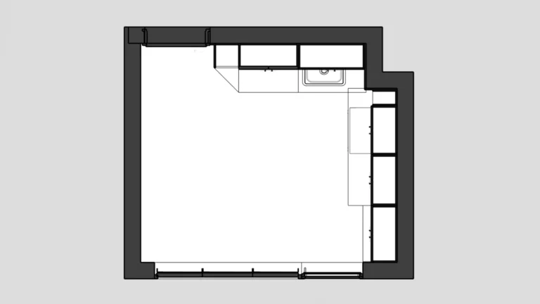 План на кухнята с L-образно разпределение и скосен шкаф при входа.